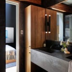Not Going Dark and Moody in Your Windowless Bathroom Is a Missed Opportunity